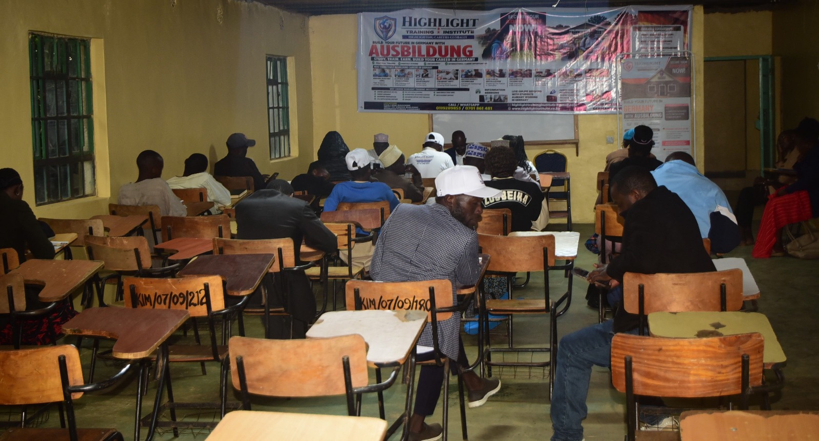 Evening information session with students in classroom
